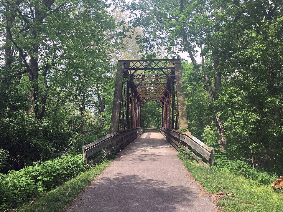 A wooden bridge crossing the Little Miami River