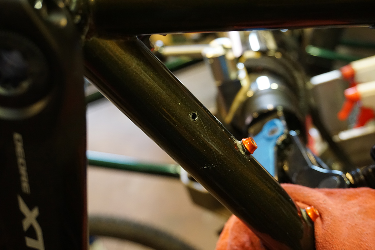 Drilled hole in the frame for a dropper post. 