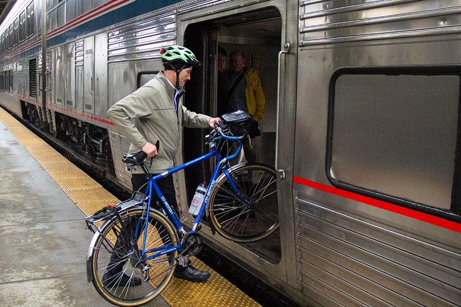 Jeff loads his bike onto Amtrak