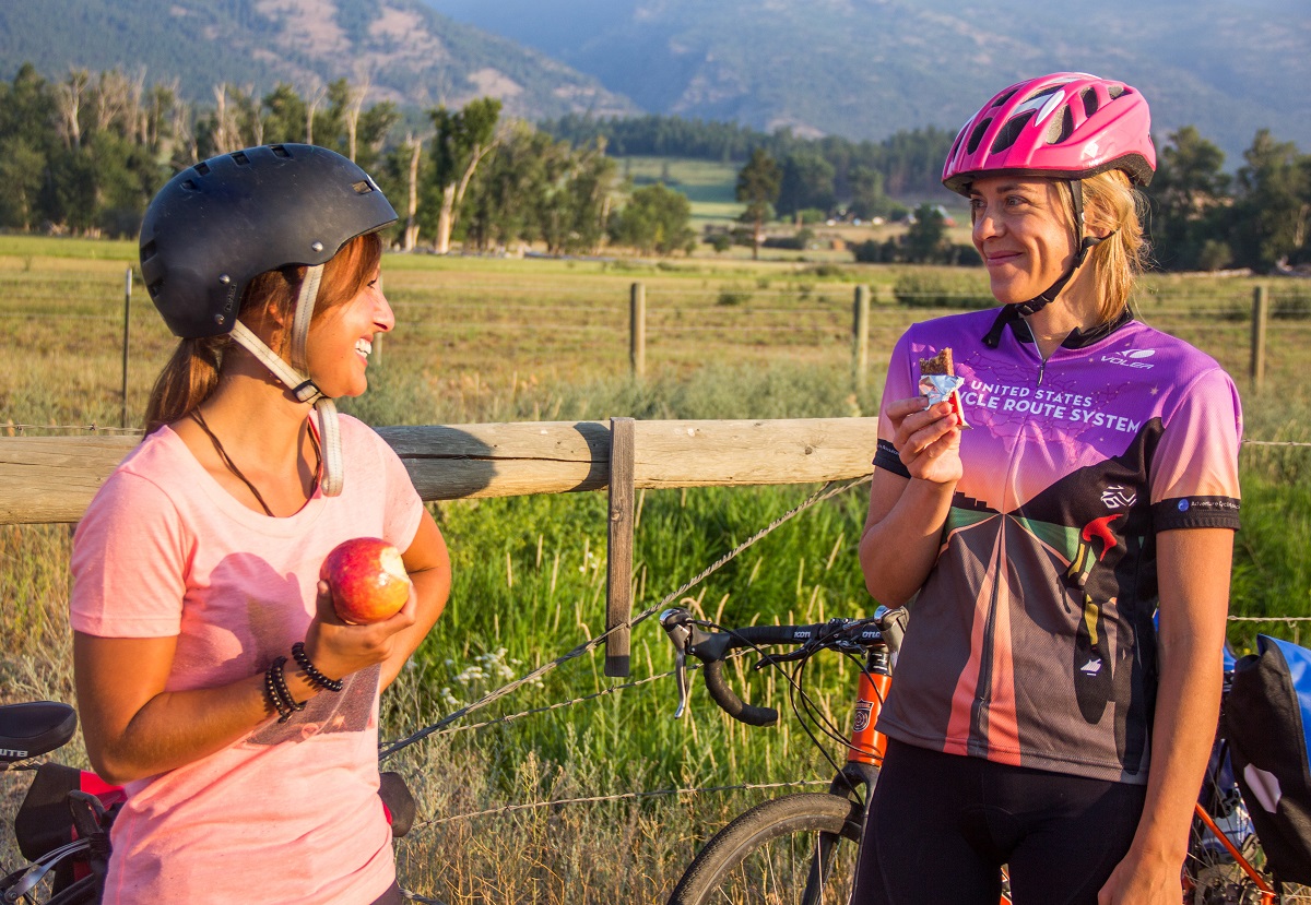 Eating nutritious food and hydrating often will keep you healthy while training for a bike tour.