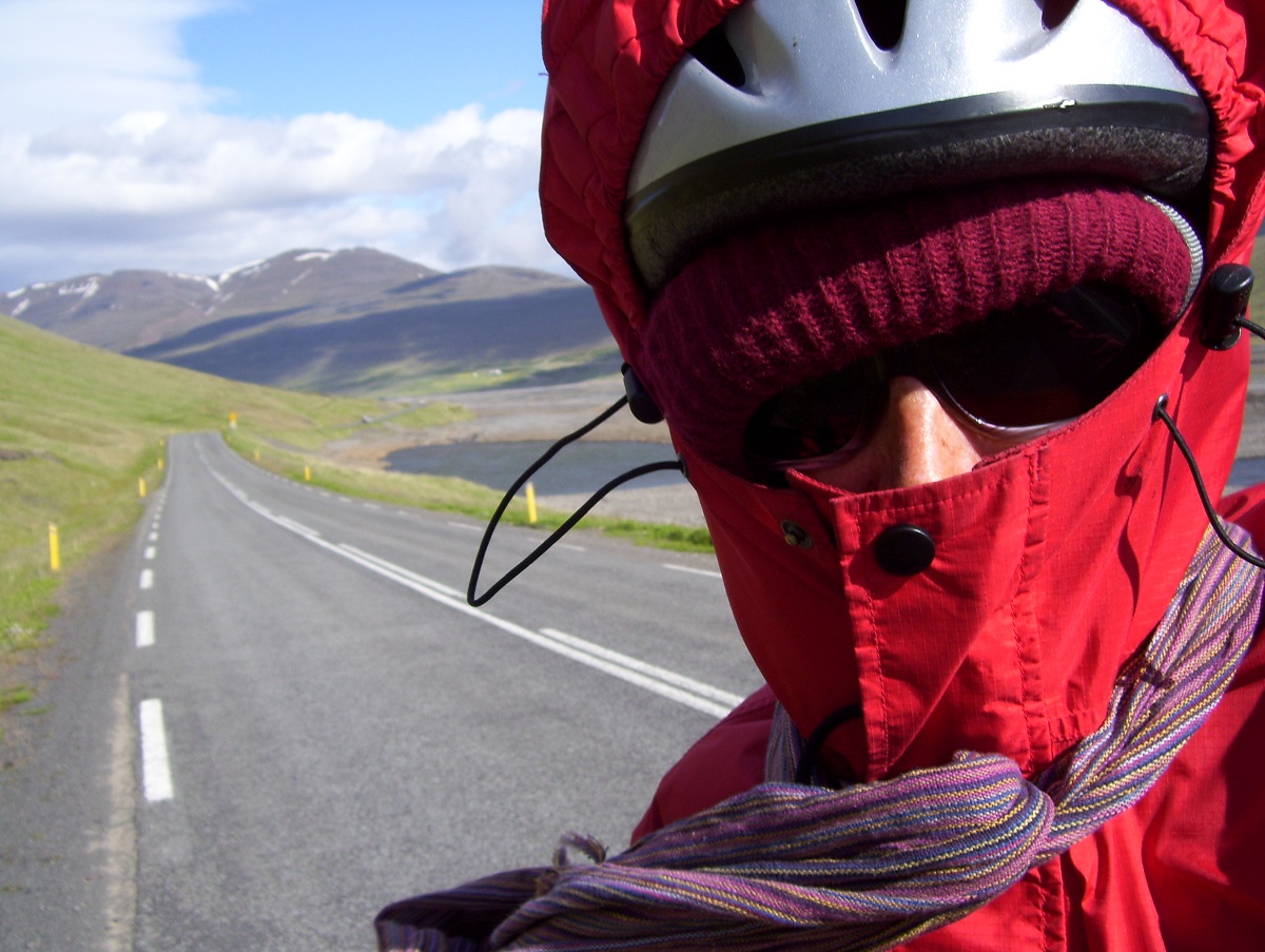 Laura wear clothes against the Iceland wind on her bike tour