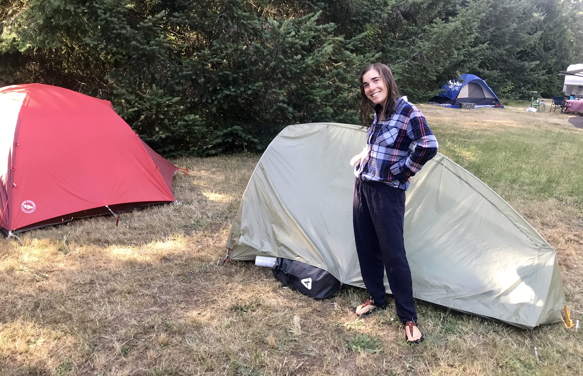 Briana Cohen in front of her tent
