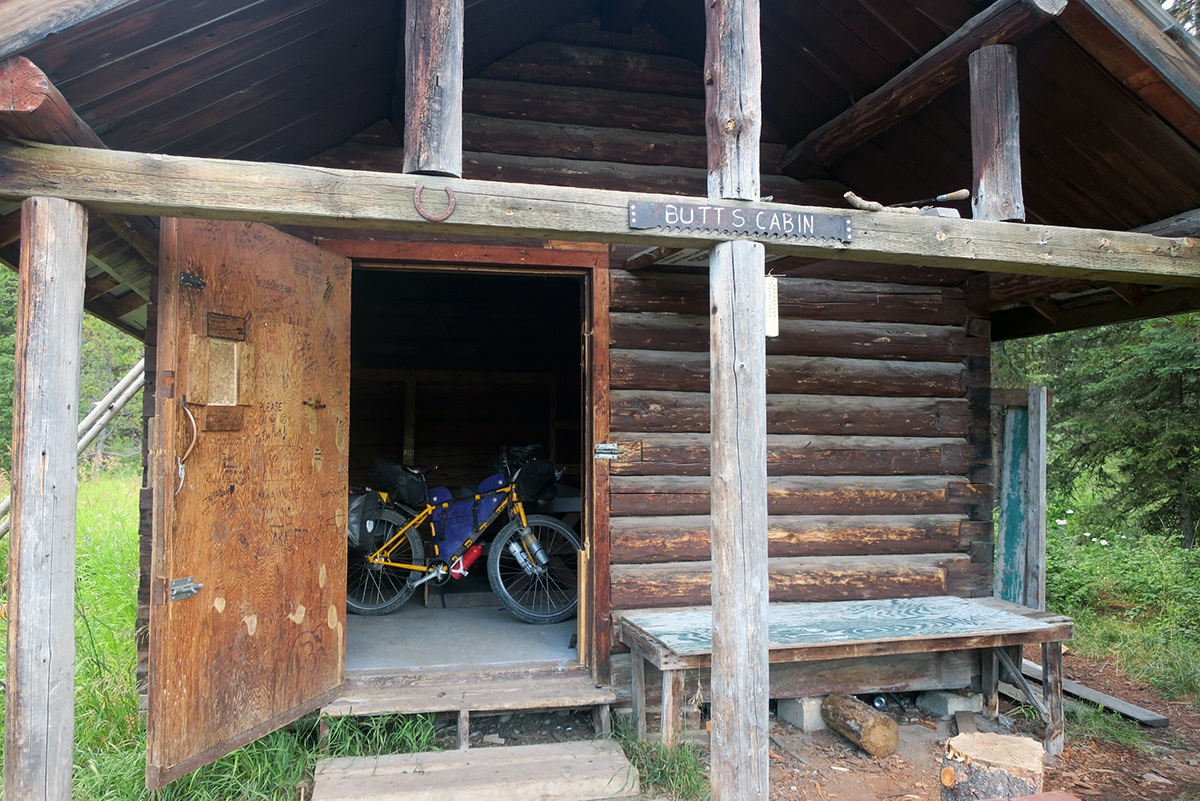 A photo of Butts Cabin with Tara's bike in the doorway