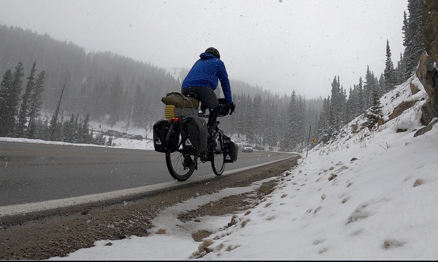 cyclist on a snowy road