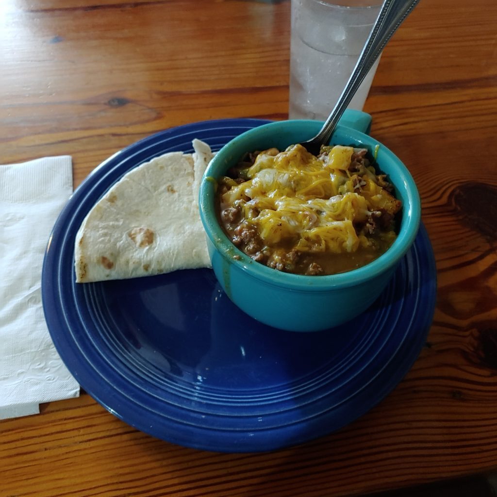 chili with bread on a plate