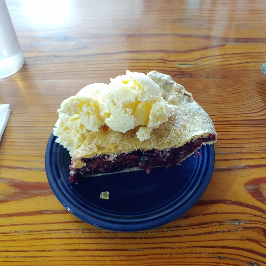 a piece of pie and ice cream 