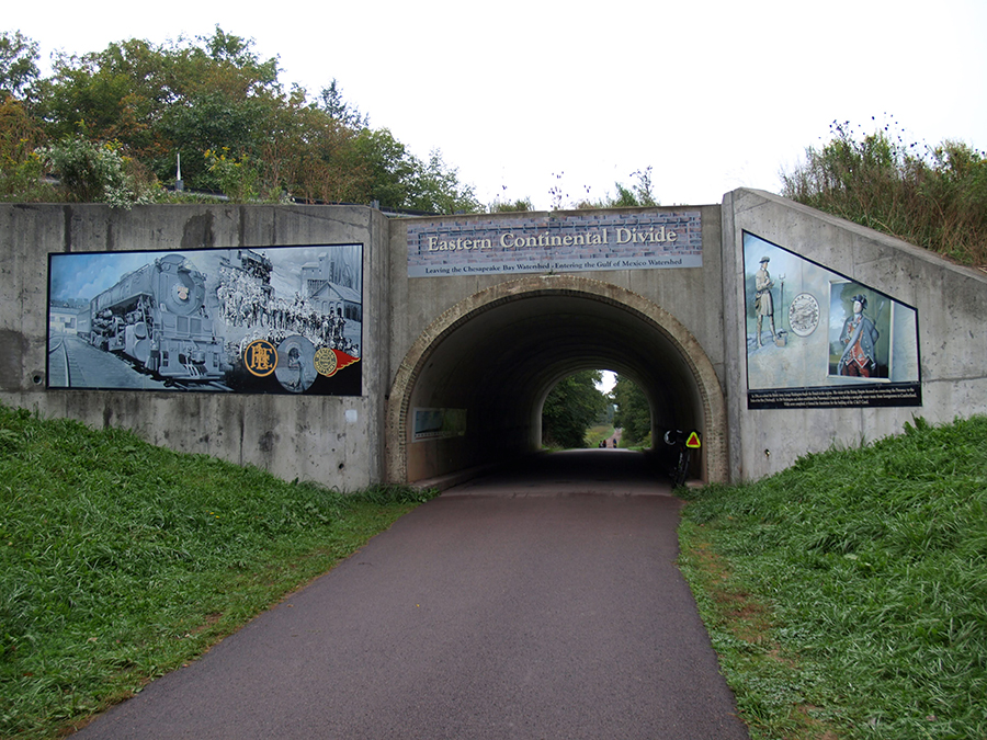 A tunnel with an Eastern Continental Divide sign