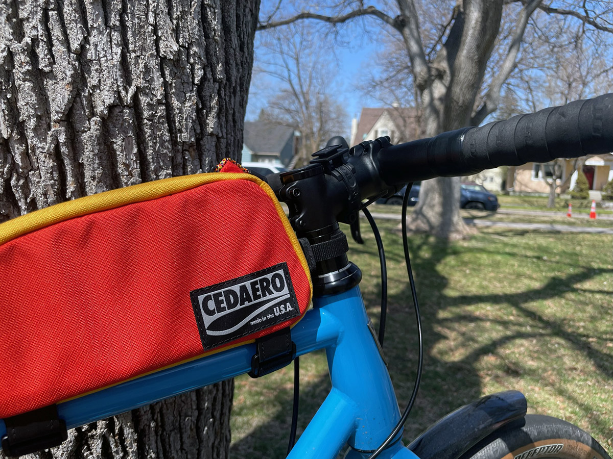 A colorful frame bag on a bicycle.