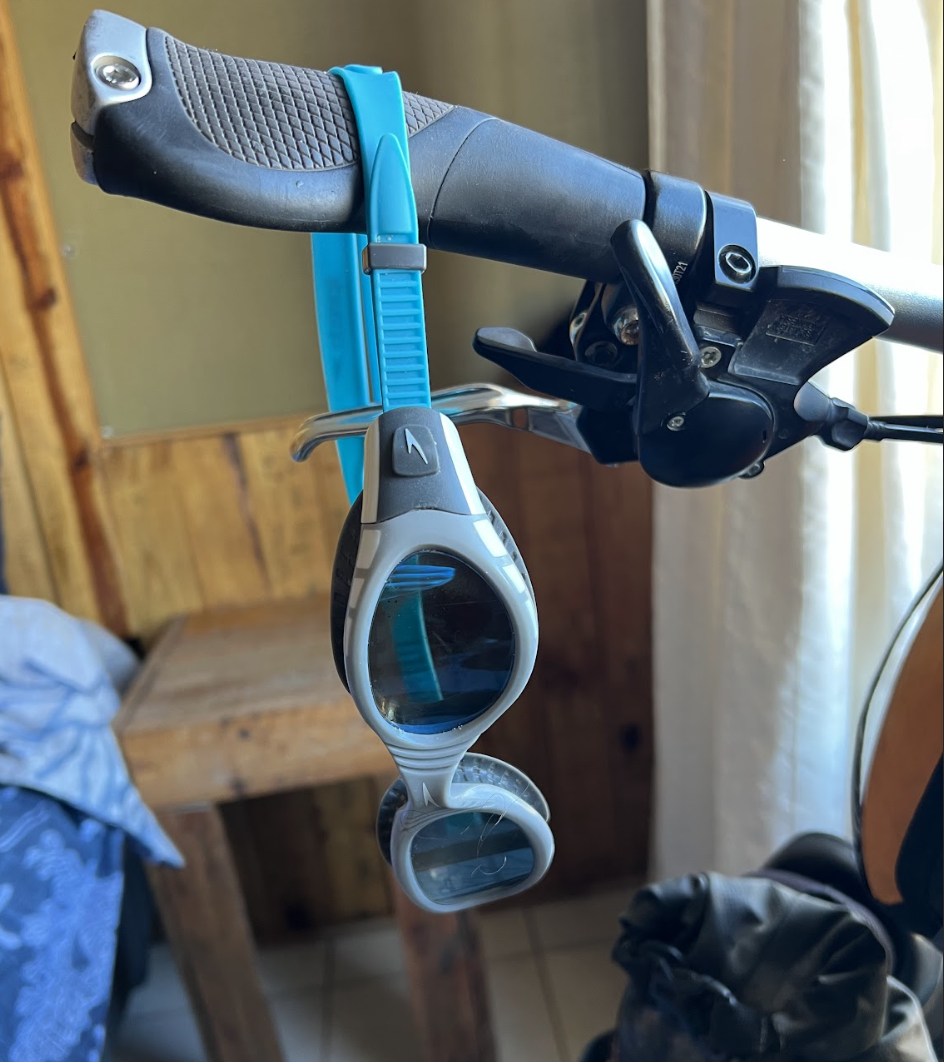 goggles on bicycle handlebars