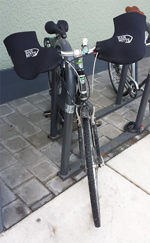 photo of a bicycle focused on the bar mitts