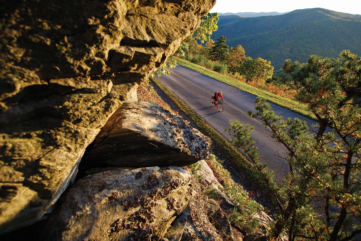 Dennis Coello incorporates landscape into his adventure cycling photography.