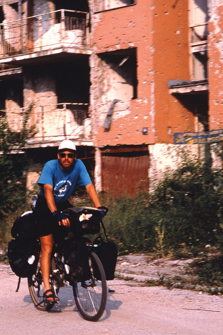 Willie Weir pedals through Bosnia after the war