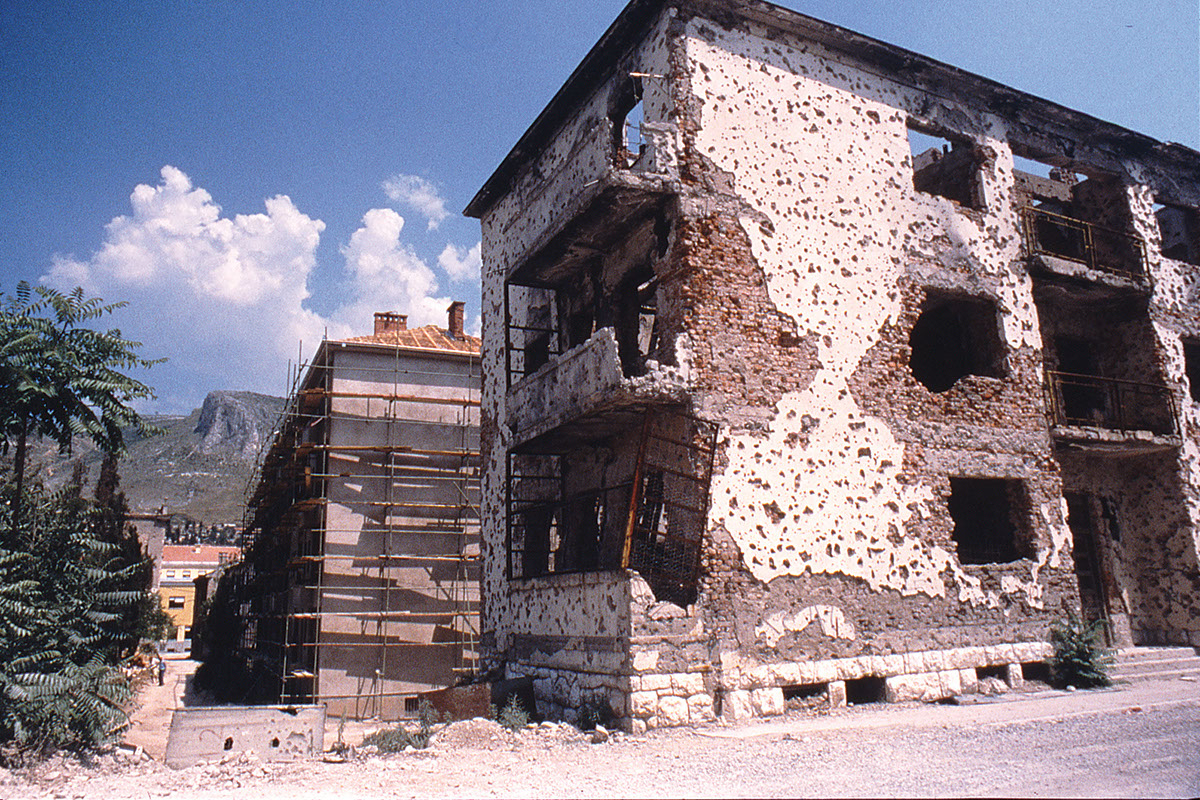 Willie Weir pedals through Bosnia after the war