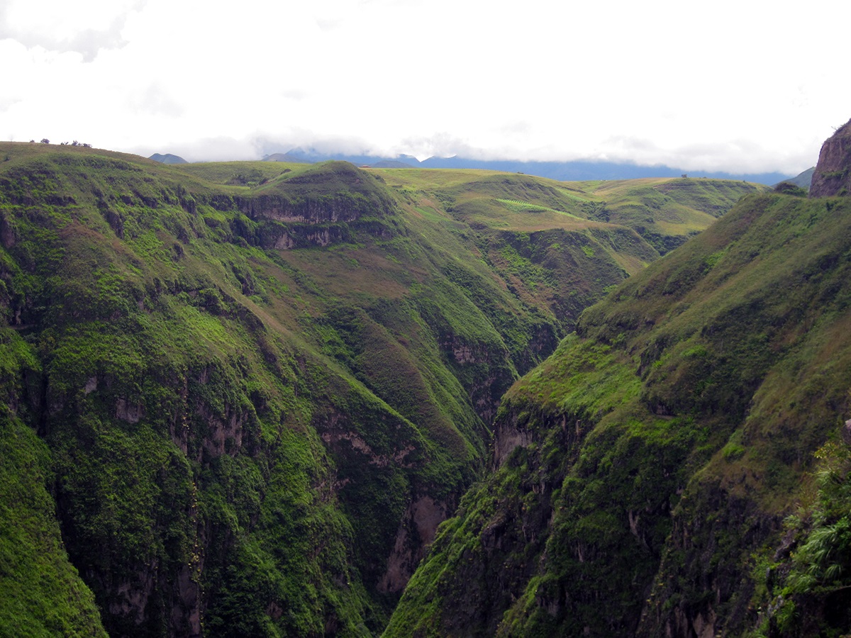 Deep green canyons and wild roads in southern Colombia. 