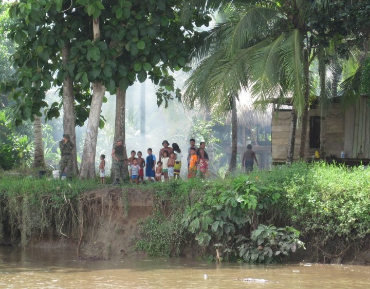 amilies on the riverbank near the remote village of El Real, Darién Province, Panama. 