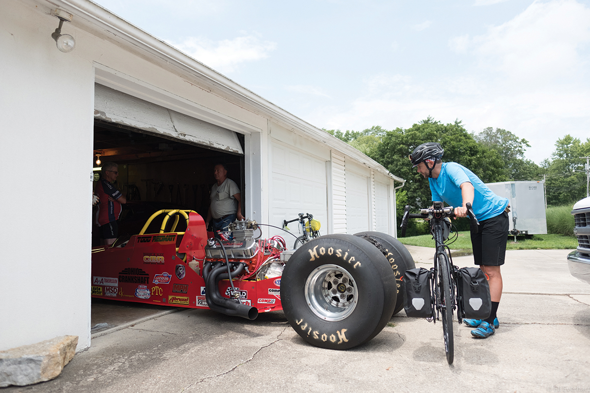 Nick Legan checks out a drag racing car in Centerville.