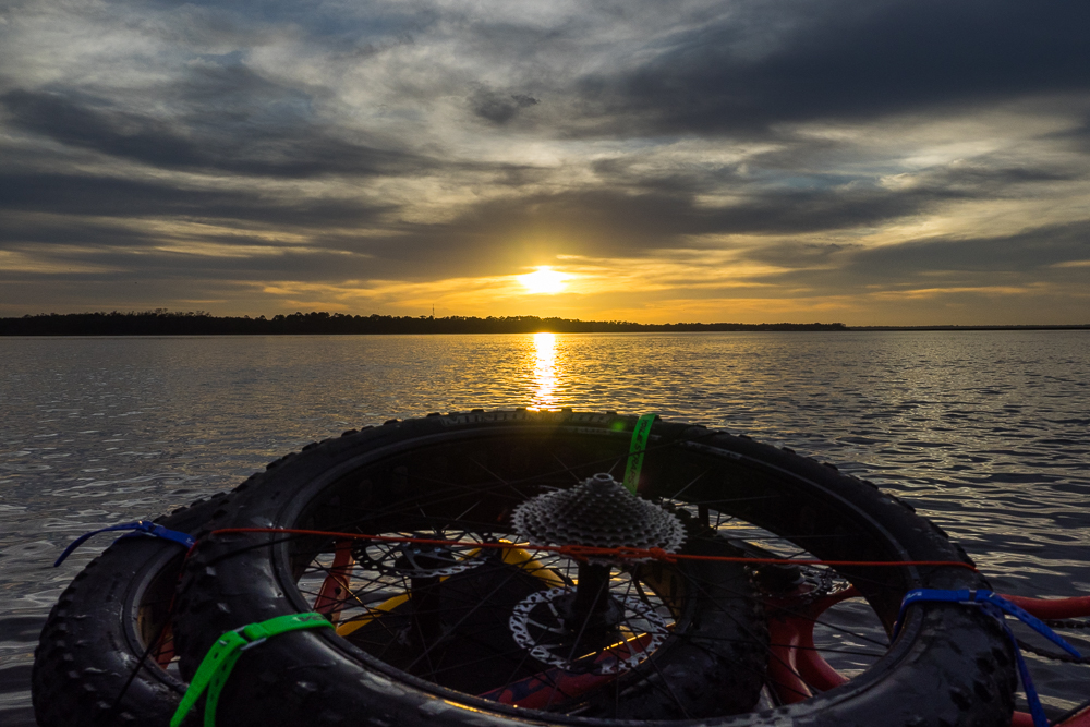 A fat bike doesn’t leave much room for the paddler in a packraft.