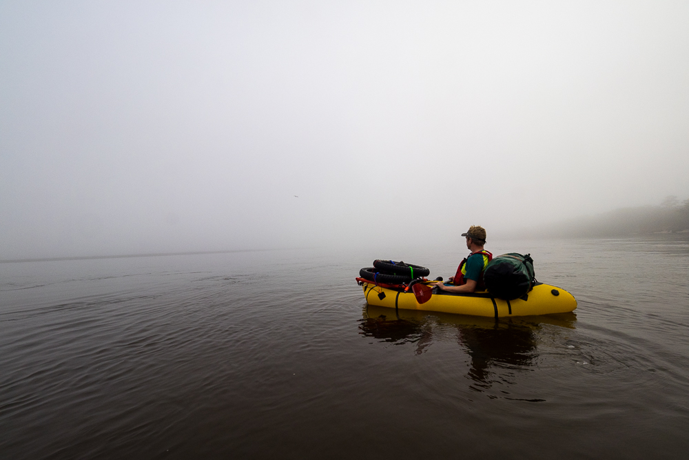 Bike rafting through the fog to the island.