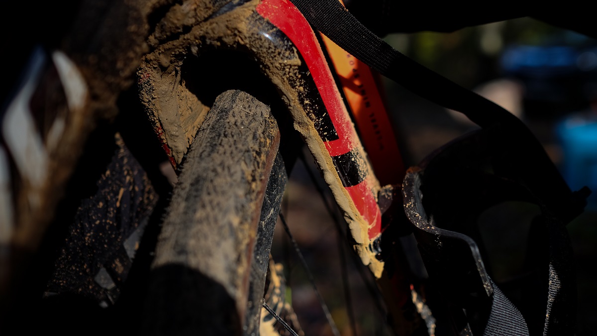 Mud sticks to Jessica's frame and builds up around the wheels.