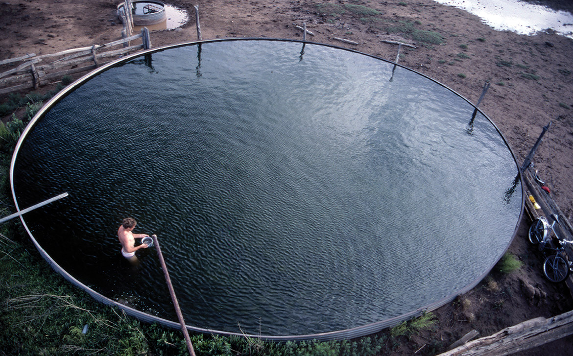 When bikepacking, a water holding tank is just as good a bath as any.