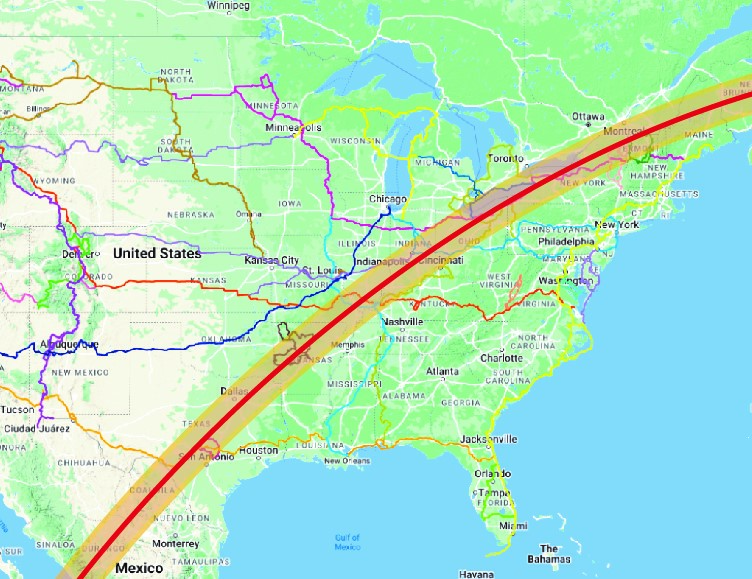 the path of the eclipse on top of a map of Adventure Cycling routes