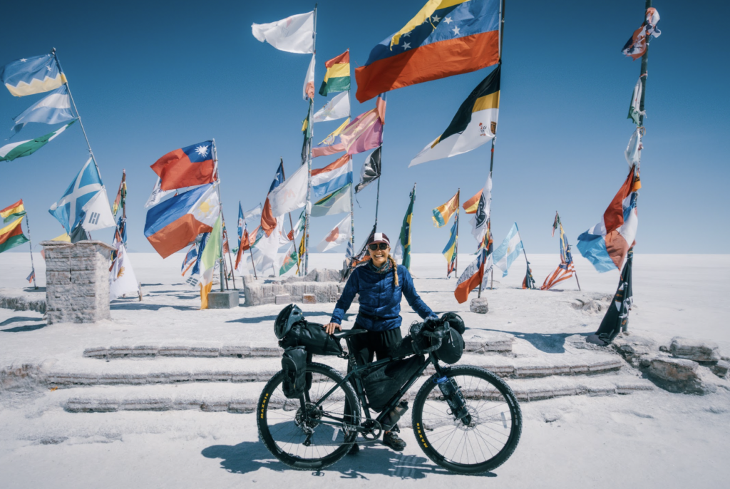 McKenzie Barney in front of flags 