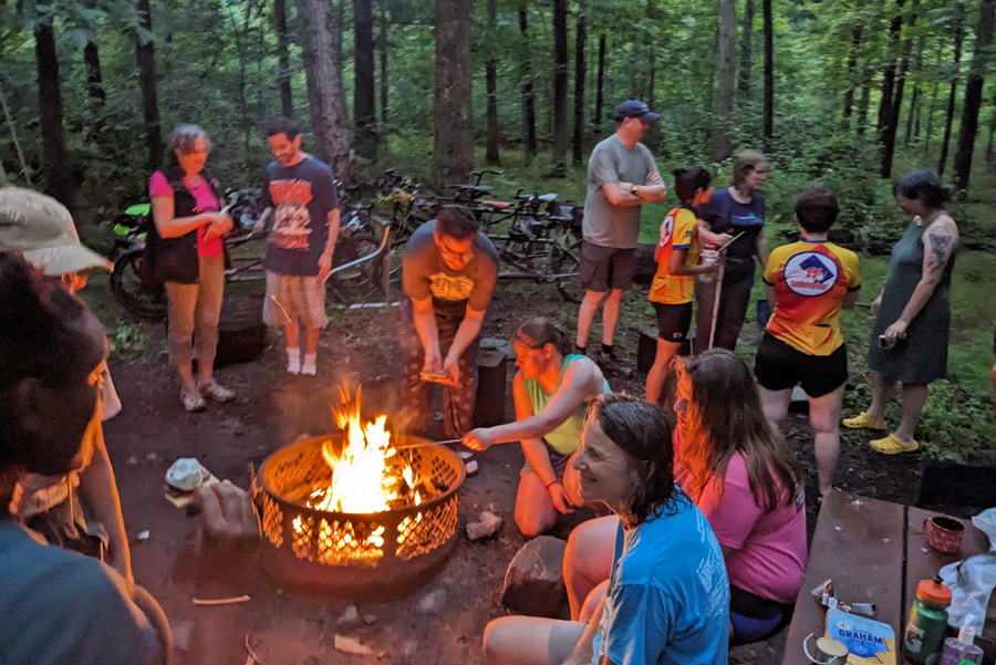 people around a campfire