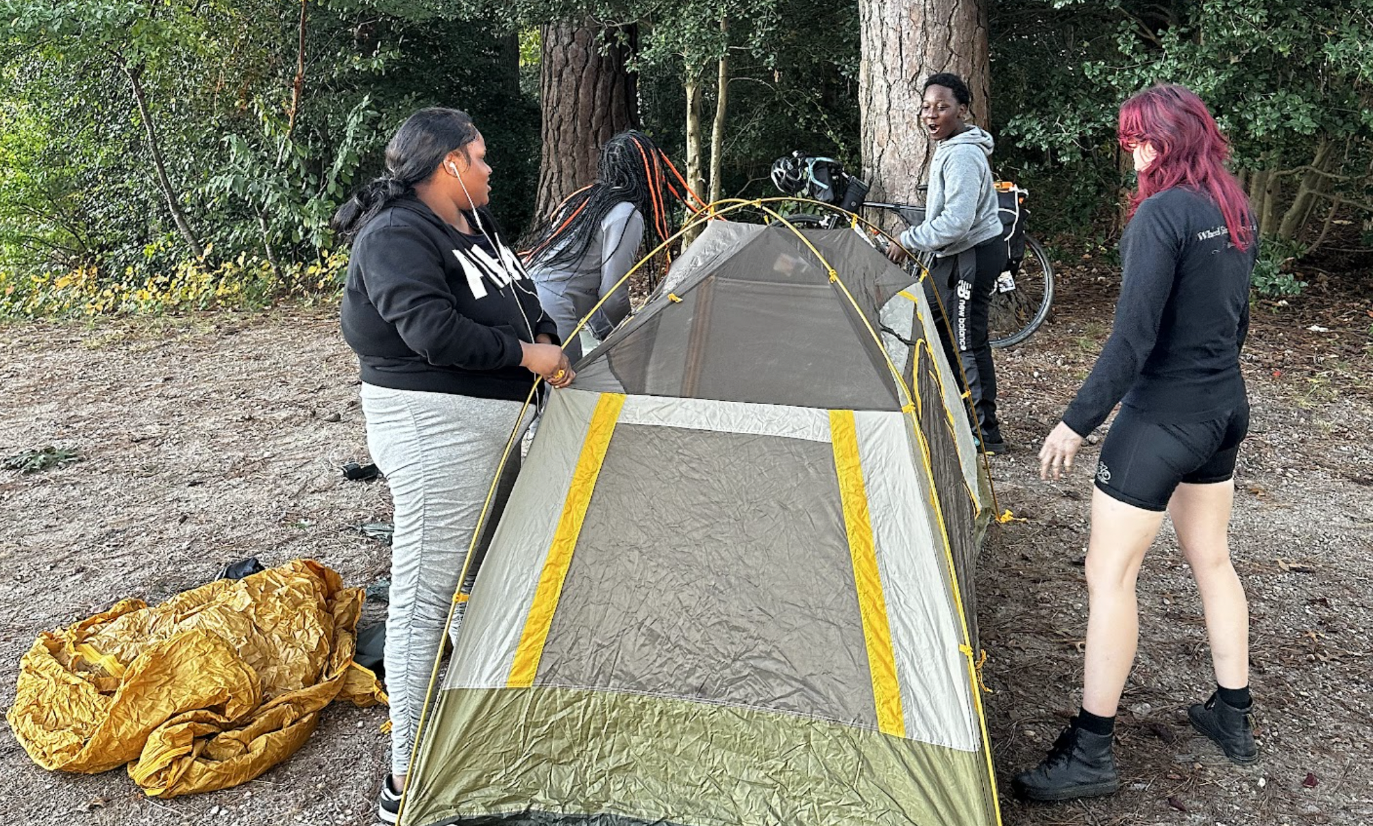 campers around a tent
