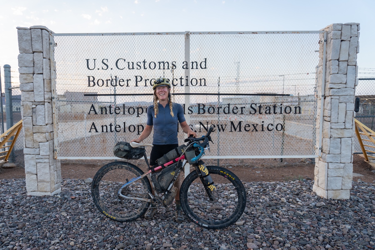 Meaghan Hackinen at Antelope Wells Border Station on the Great Divide Mountain Bike Route