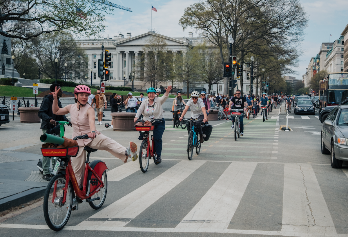 Cyclists use Capital Bikeshare bicycles to protest the removal of a bike lane