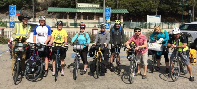 Nine cyclists in Ventura pose for a photo before starting their ride to Ojai